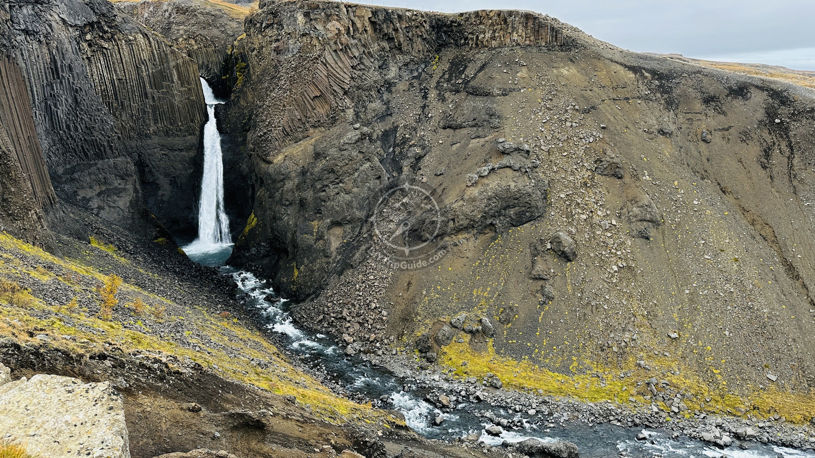 A second view of Hengifoss and the layered East Iceland valley.