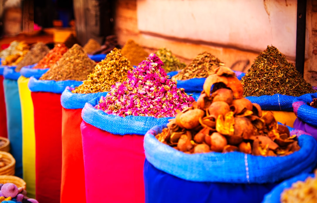 Colorful spice market stall in the Marrakech medina
